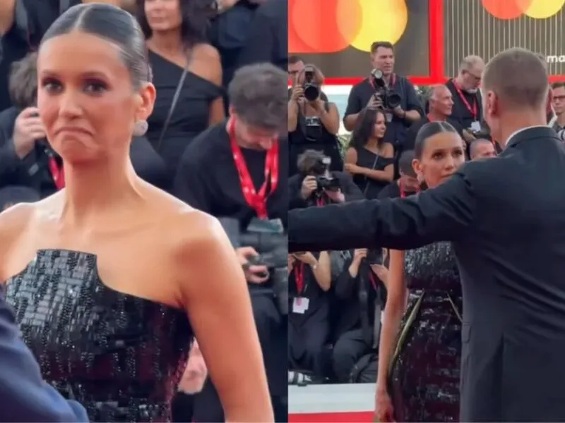 Fotógrafos tentam manter Nina Dobrev no tapete vermelho em Veneza